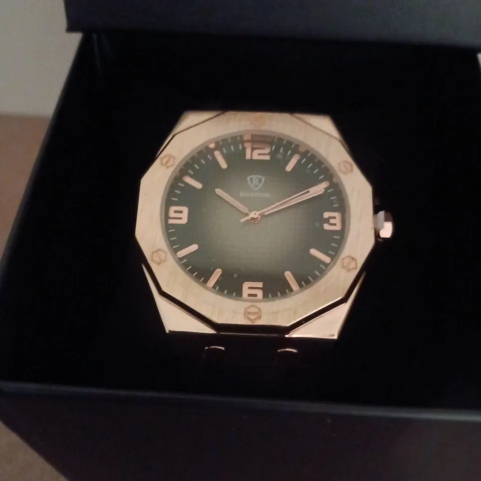 RUCKSTUHL GOLD COLOUR WRISTWATCH WITH BLACK RUBBER STRAP