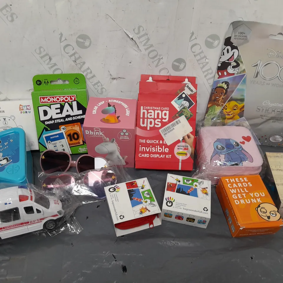 APPROXIMATELY 14 ASSORTED TOYS & GAMES PRODUCTS TO INCLUDE FRIENDS TRIVIA GAME, DHINK LIGHT, CARD GAMES, ETC