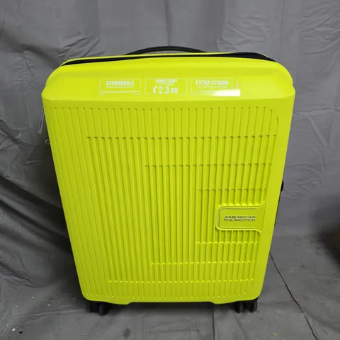 AMERICAN TOURIST 55CM HARDSHELL SUITCASE IN LIGHT YELLOW
