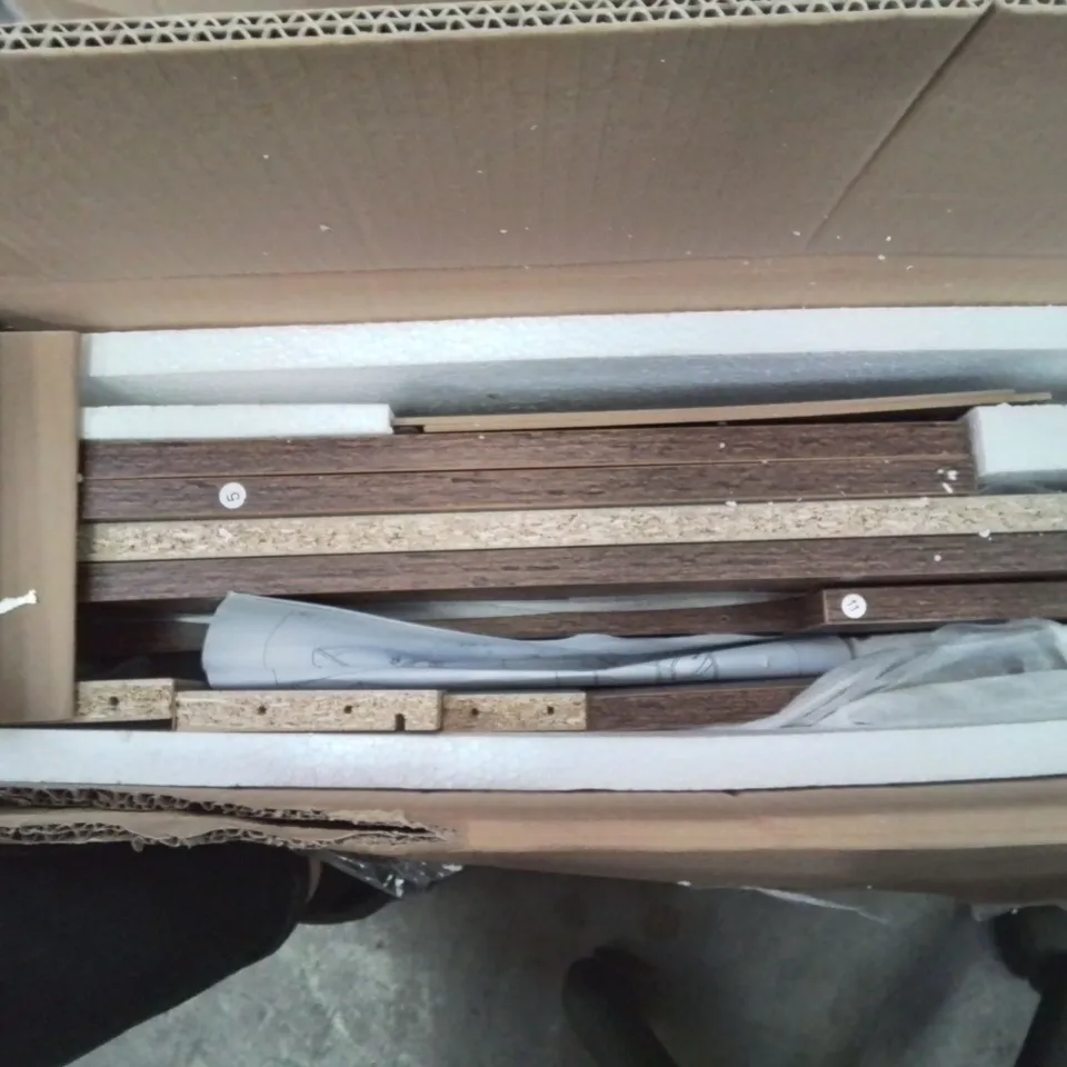 A BOXED 3 DRAWER CABINET ON WHEELS IN BROWN 