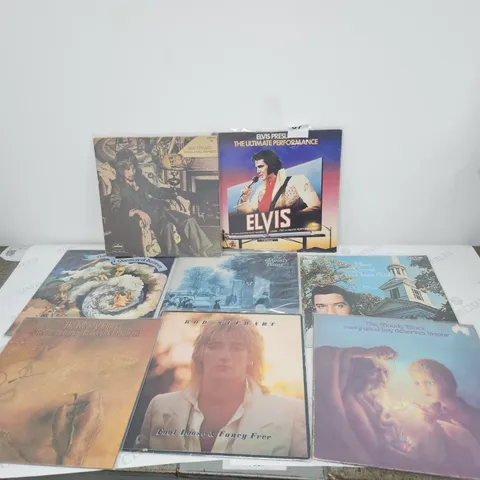 8 X VINYL RECORD LPS.