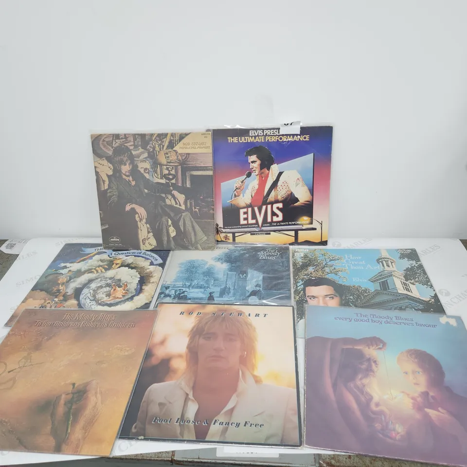 8 X VINYL RECORD LPS.