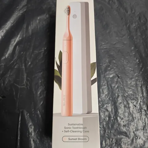 SEALED SURI SUSTAINABLE SONIC TOOTHBRUSH + SELF-CLEANING CASE – SUNSET BLOOM