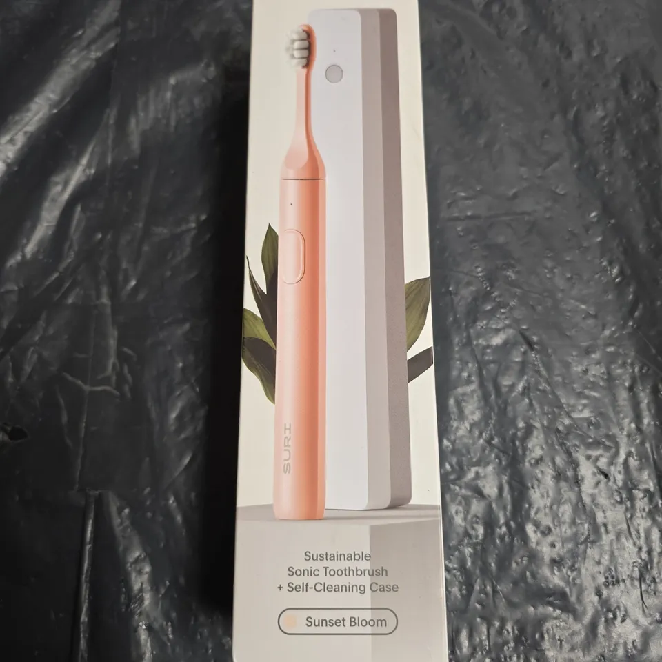 SEALED SURI SUSTAINABLE SONIC TOOTHBRUSH + SELF-CLEANING CASE – SUNSET BLOOM