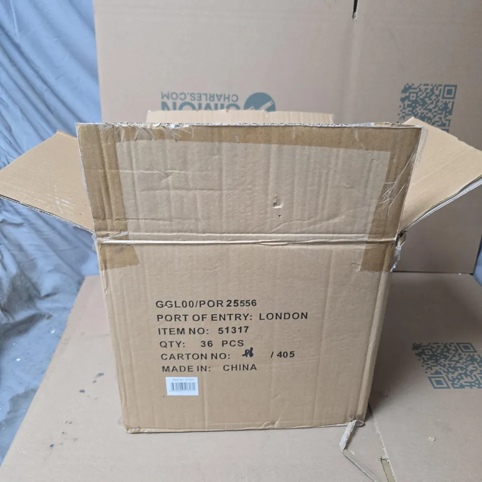 BOX OF APPROXIMATELY 35 GISELA GRAHAM UNSCENTED CANDLES 