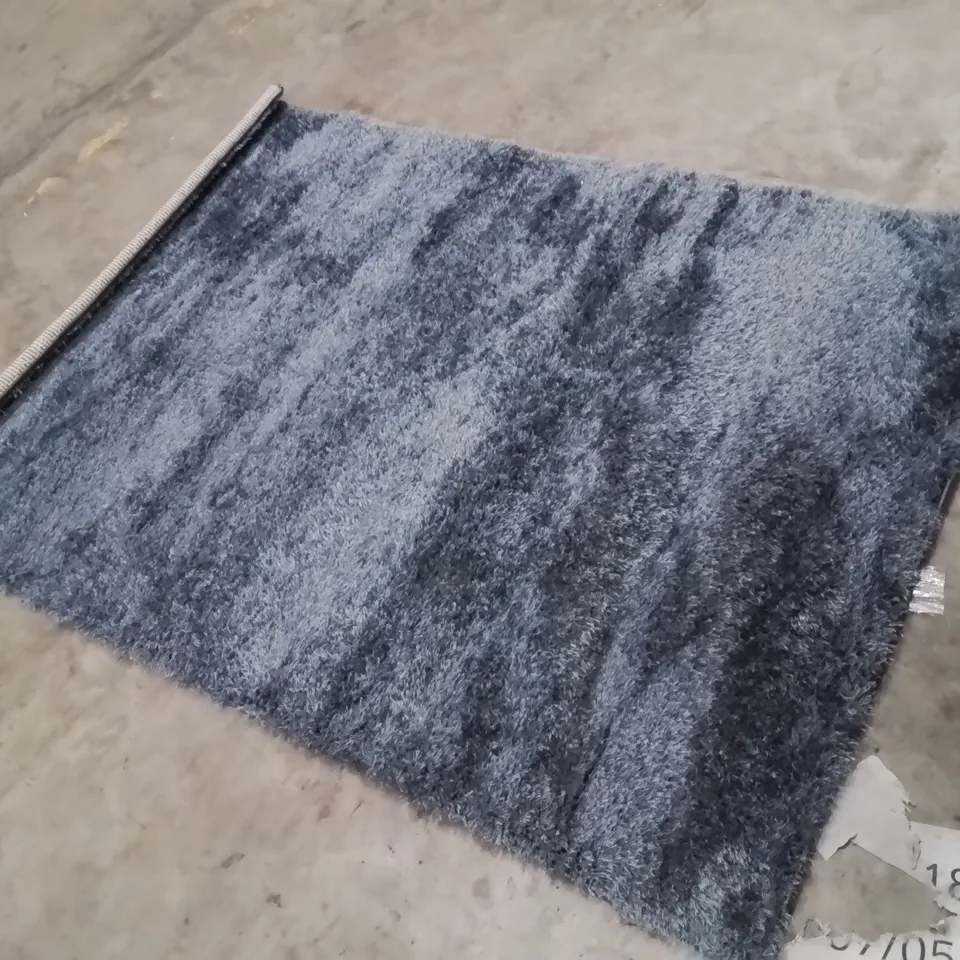 STILLAGE OF APPROXIMATELY 20 QUALITY DESIGNER RUGS XL