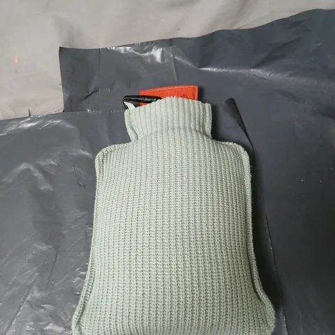 STOOV HOT WATER BOTTLE. UNBOXED