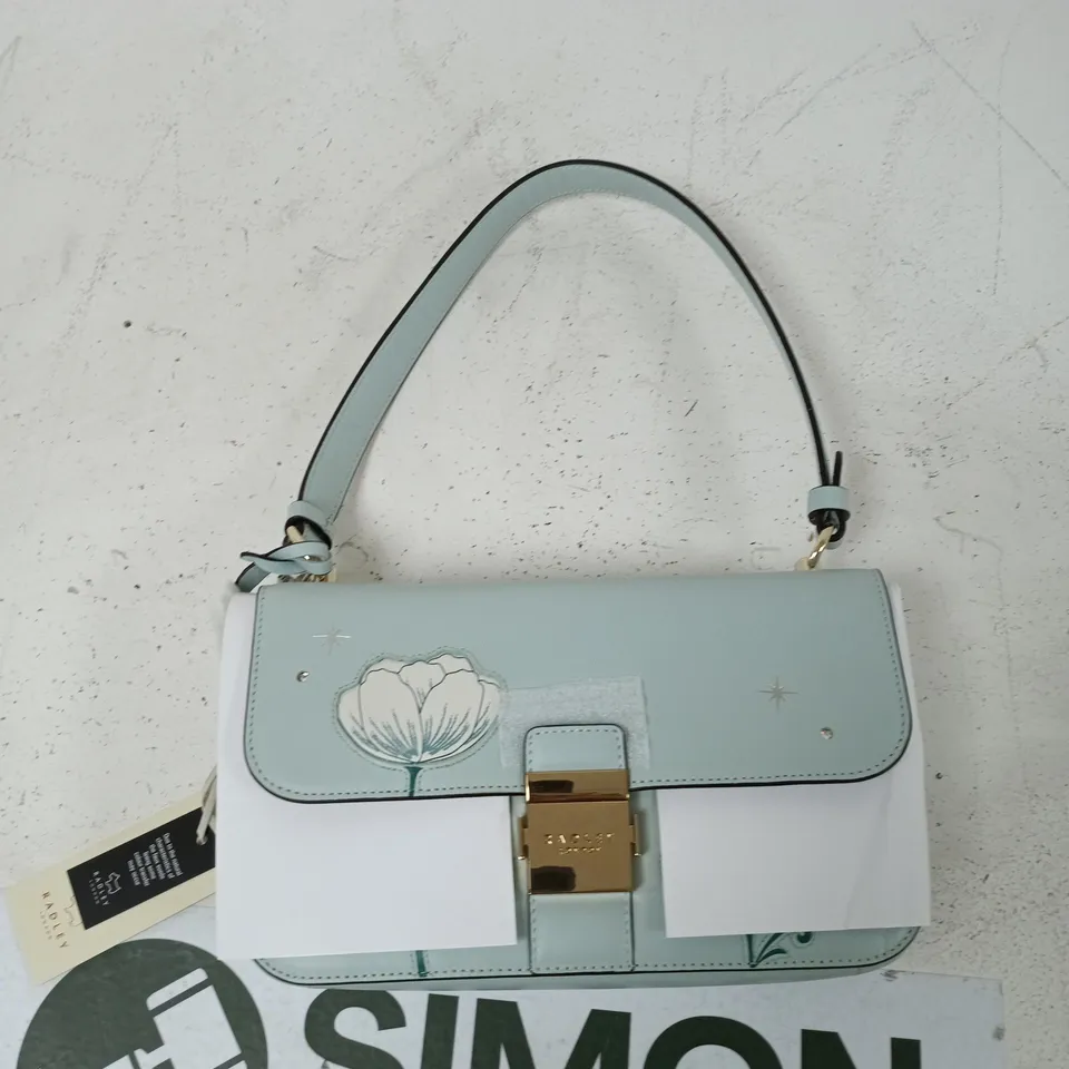 RADLEY LONDON HANDBAG – PASTEL BLUE AND WHITE TWO-TONE WITH FLORAL FLAP AND GOLD CLASP
