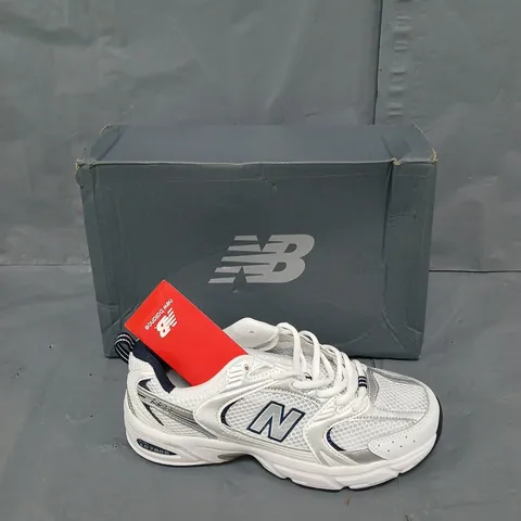 BOXED PAIR OF 530 RUNNING METALIC/NAVY UK 6