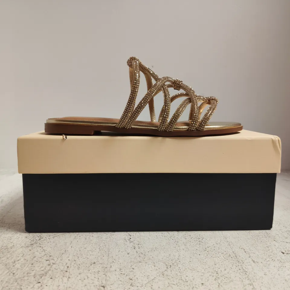 BOXED PAIR OF KURT GEIGER PERLA OPEN TOE FLAT SANDALS IN GOLD W. JEWEL DETAIL SIZE EU 37