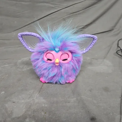 FLUFFY PLUSH TOY: PURPLE-BLUE CREATURE WITH PINK FACE AND TRANSLUCENT WINGS