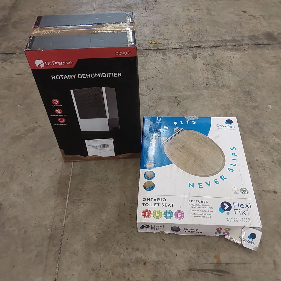 PALLET OF ASSORTED HOUSEHOLD ITEMS AND CONSUMER PRODUCTS. INCLUDES; ROTARY DEHUMIDIFIER, TOILET SEAT, SUITCASE ETC