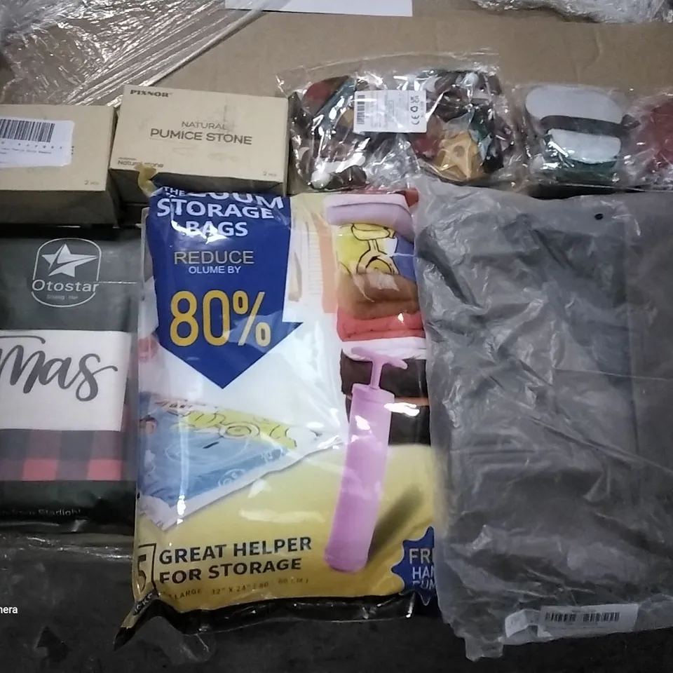 PALLET OF ASSORTED ITEMS INCLUDING NATURAL PUMICE STONE, VACUUM STORAGE BAGS, CHRISTMAS THROW PILLOW COVERS, CHRISTMAS DECORATIONS, WOMENS LEATHER BLAZER