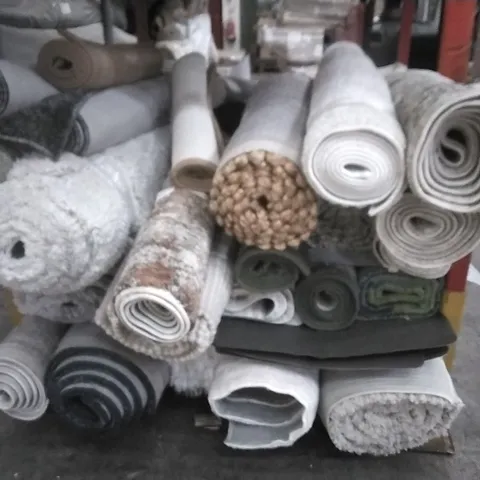 STILLAGE OF APPROXIMATELY 24 DESIGNER RUGS