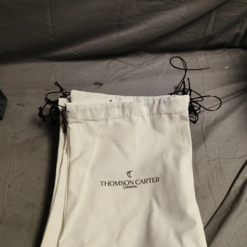 APPROXIMATELY 10 THOMSON CARTER DRAWSTRING BAGS
