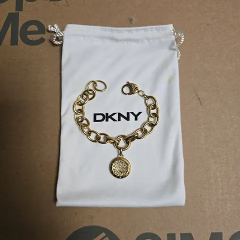 DKNY GOLD TONE PENDANT BRACELET 