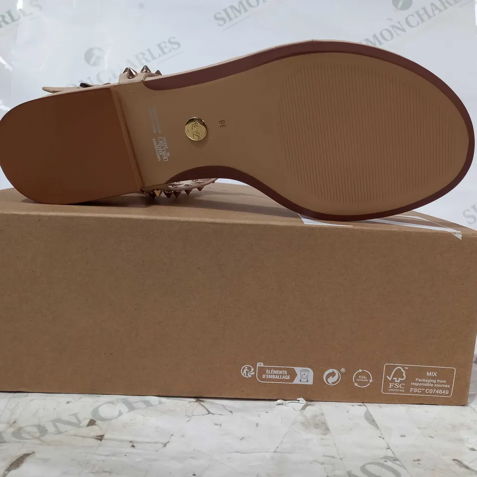 BOXED PAIR OF ZARA FLAT SANDALS IN NUDE COLOUR W. GOLD EFFECT SPIKE STUDS EU SIZE 38