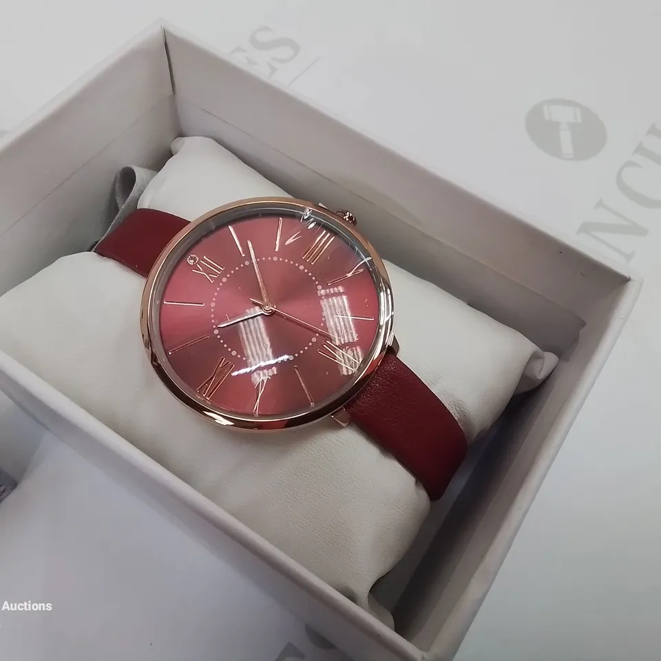 BOXED KIMOMT RED ROUND FACE WOMEN'S WATCH.