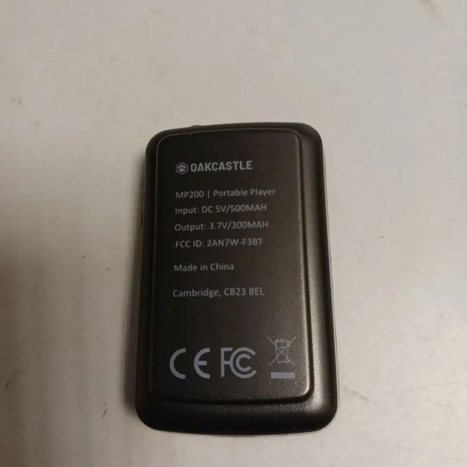 BOXED OAKCASTLE MINI PORTABLE MP3 PLAYER IN BLACK