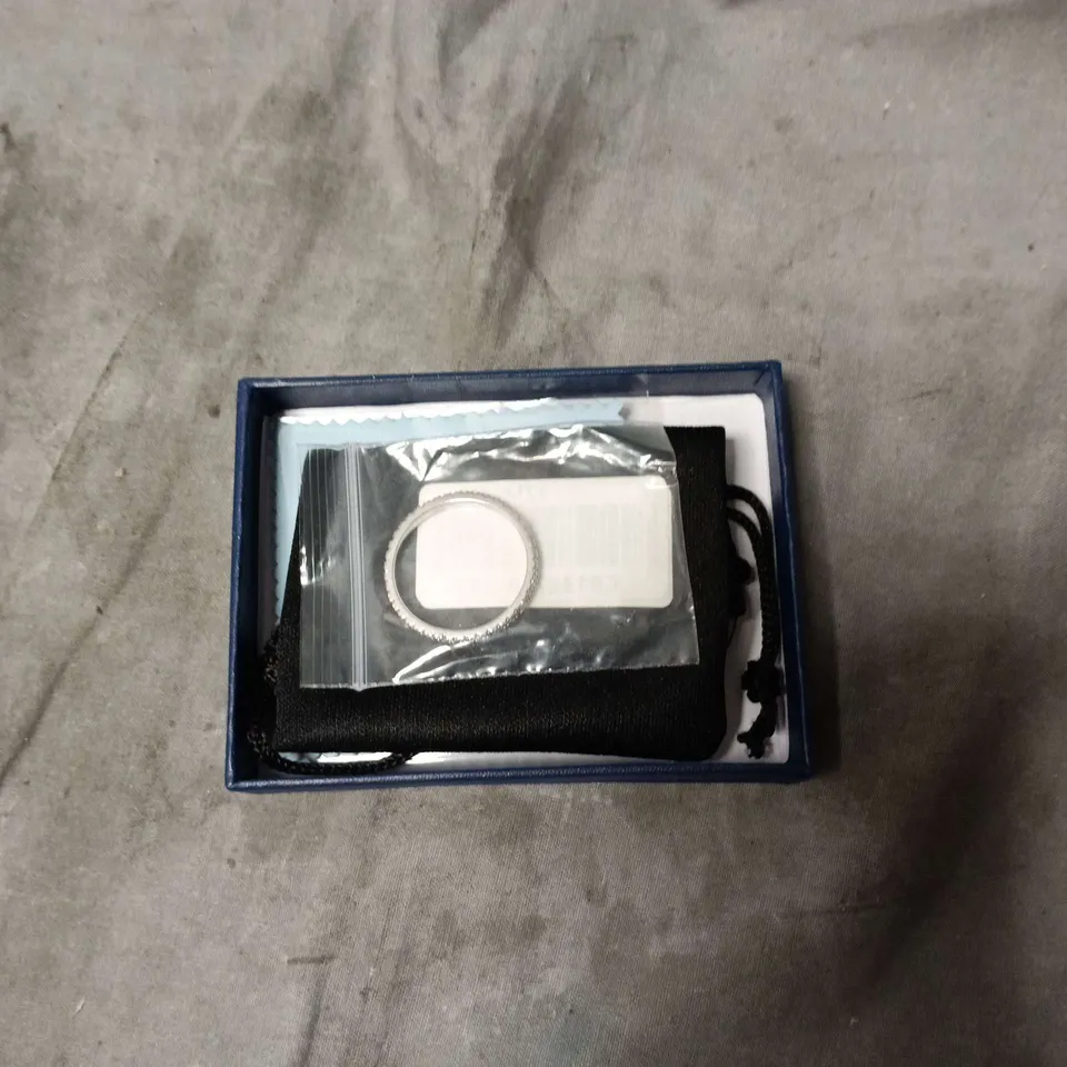 SUPLIGHT BRIGHT AS A SUPERSTAR RING IN BOX. 925 STERLING GIRLS SIZE 11