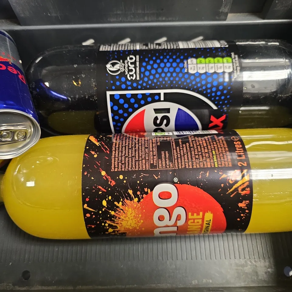 APPROXIMATELY 7 ASSORTED DRINKS ITEMS TO INCLUDE - RED BULL , TANGO ORANGE , RED BULL ETC