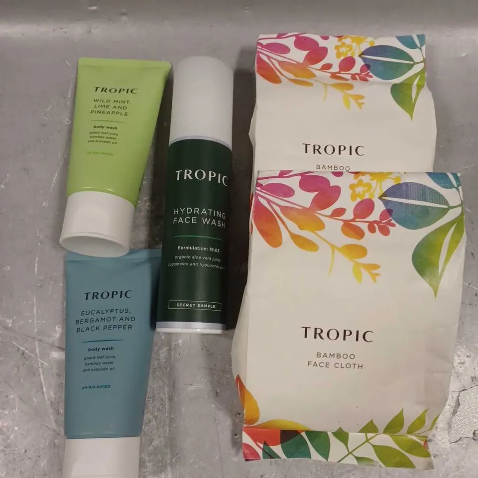 TROPIC SKINCARE LOT OF 4 ASSORTED COSMETIC ITEMS TO INCLUDE - BAMBOO FACE CLOTH - WILD MINT, LIME AND PINEAPPLE BODY WASH - HYDRATING FACE WASH - ETC