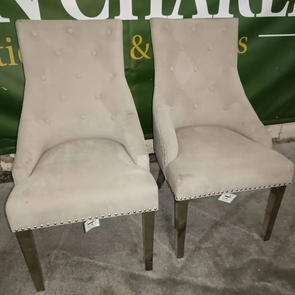 PAIR OF BEIGE FABRIC UPHOLSTERED DINING CHAIRS ON CHROME LEGS WITH STUD DETAILS