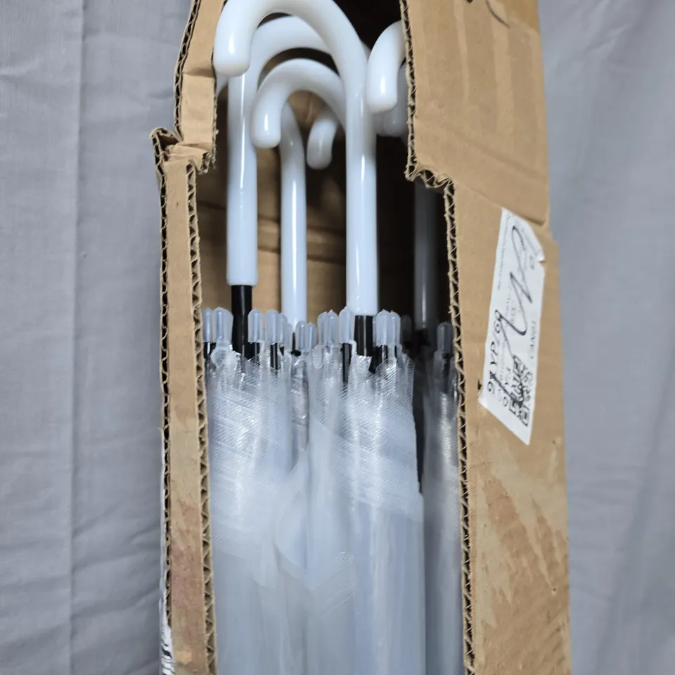 APPROXIMATELY 6 WHITE FOLDING UMBRELLAS – BOXED SET