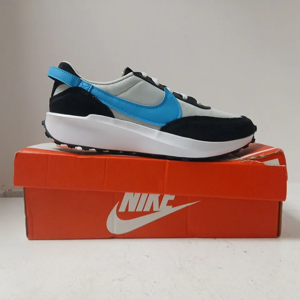 BOXED PAIR OF NIKE WAFFLE DEBUT TRAINERS IN GREY/BLUE/BLACK SIZE UK 9