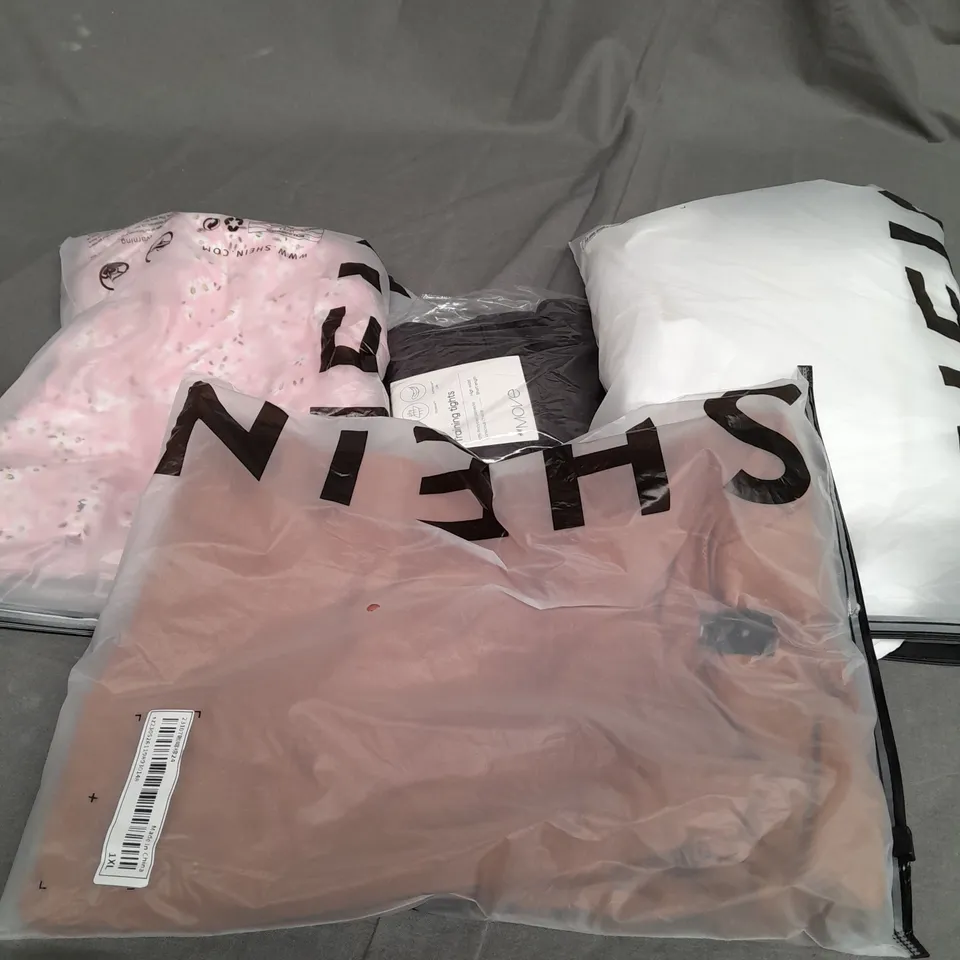 LARGE QAUNTIITY OF ASSORTED CLOTHES IN VARIOUS COLORS AND SIZES TO INCUDED DRESSES, T-SHIRTS , TROUSERS AND KIDS CLOTHING