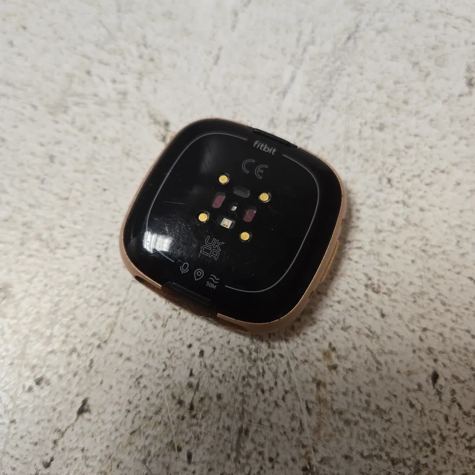 fitbit versa 4 copper rose