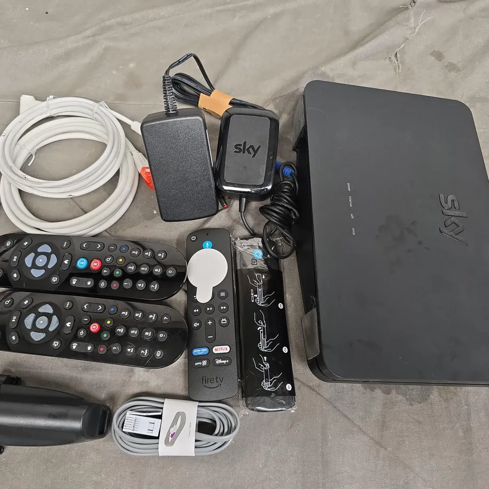 LOT OF ASSORTED TECH ITEMS TO INCLUDE SKY ROUTER, REMOTES AND ETHERNET CABLES