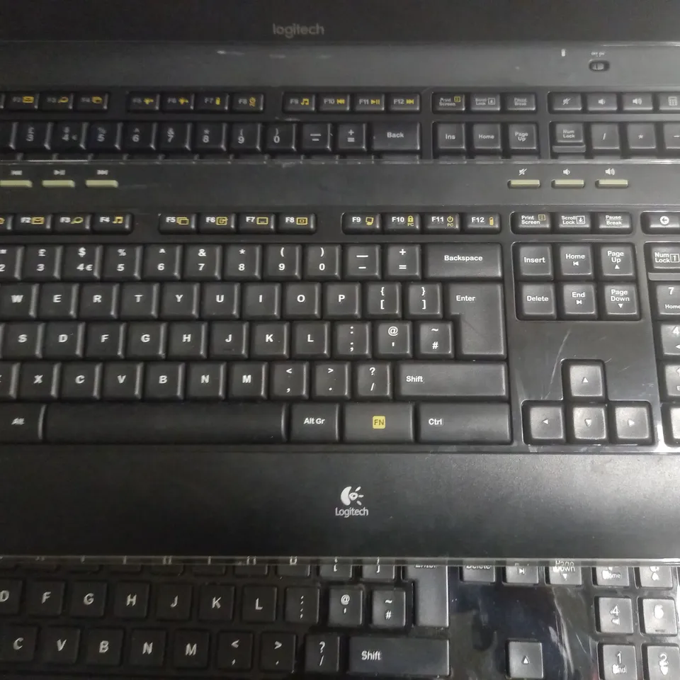 LOT OF 4 UNBOXED LOGITECH WIRELESS KEYBOARDS