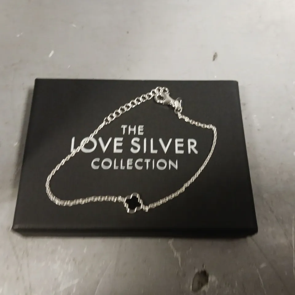 BOX OF APPROXIMATELY 5 ASSORTED ITEMS TO INCLUDE - SHACKET , ROALD DAHL THE WITCHES SIZE FR 42/44 , THE LOVE SILVER BRACELET ETC