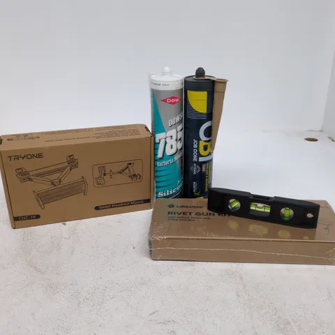 TOTE OF APPROXIMATELY 15 ASSORTED ITEMS TO INCLUDE SPIRIT LEVEL, RIVET GUN KIT, TABLET HEADREST MOUNT, SEALANT/ADHESIVE ETC