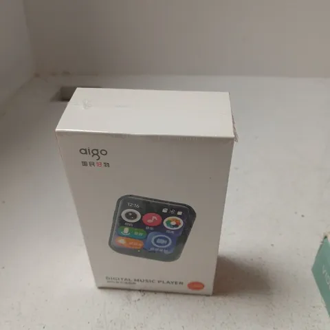box of approximately 10 assorted items including digital music player and led video light