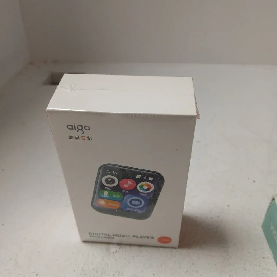box of approximately 10 assorted items including digital music player and led video light