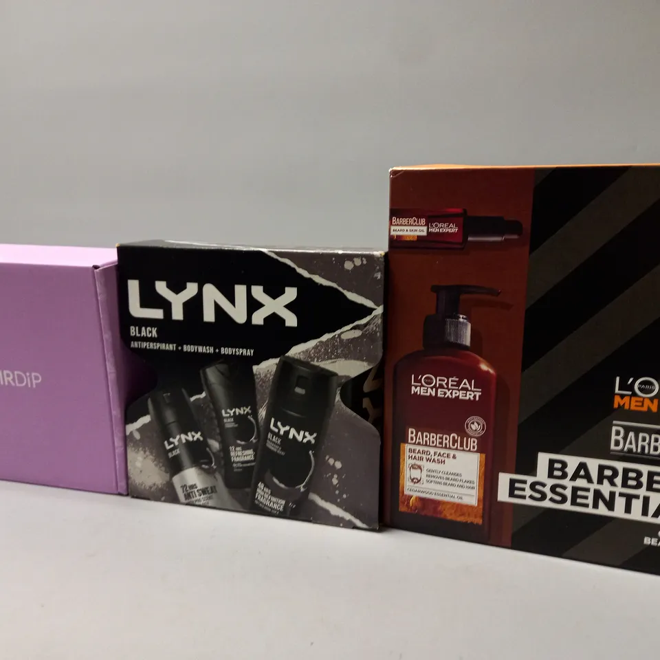 APPROXIMATELY 10 FRAGRANCE AND COSMETIC BOXSETS TO INCLUDE LOREAL EXPERT , LYNX GIFT SET , DAVID BECKHAM , ETC 