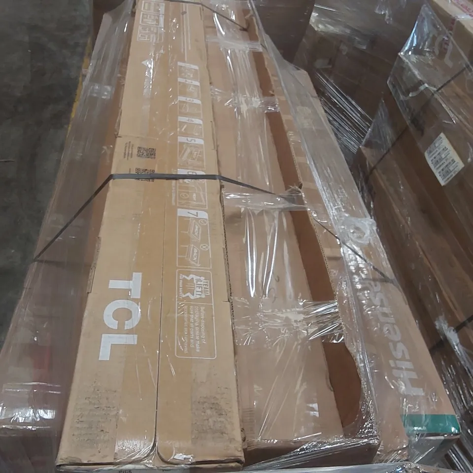 PALLET CONTAINING A LARGE QUANTITY OF ASSORTED DAMAGED TVs