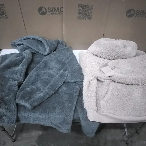 A PALLET TO CONTAIN APPROXIMATELY 60 WOMENS DESIGNER CLOTHES WHICH INCLUDE; FLUFFY THROW OVERS, SNUGGLE TOPS ETC