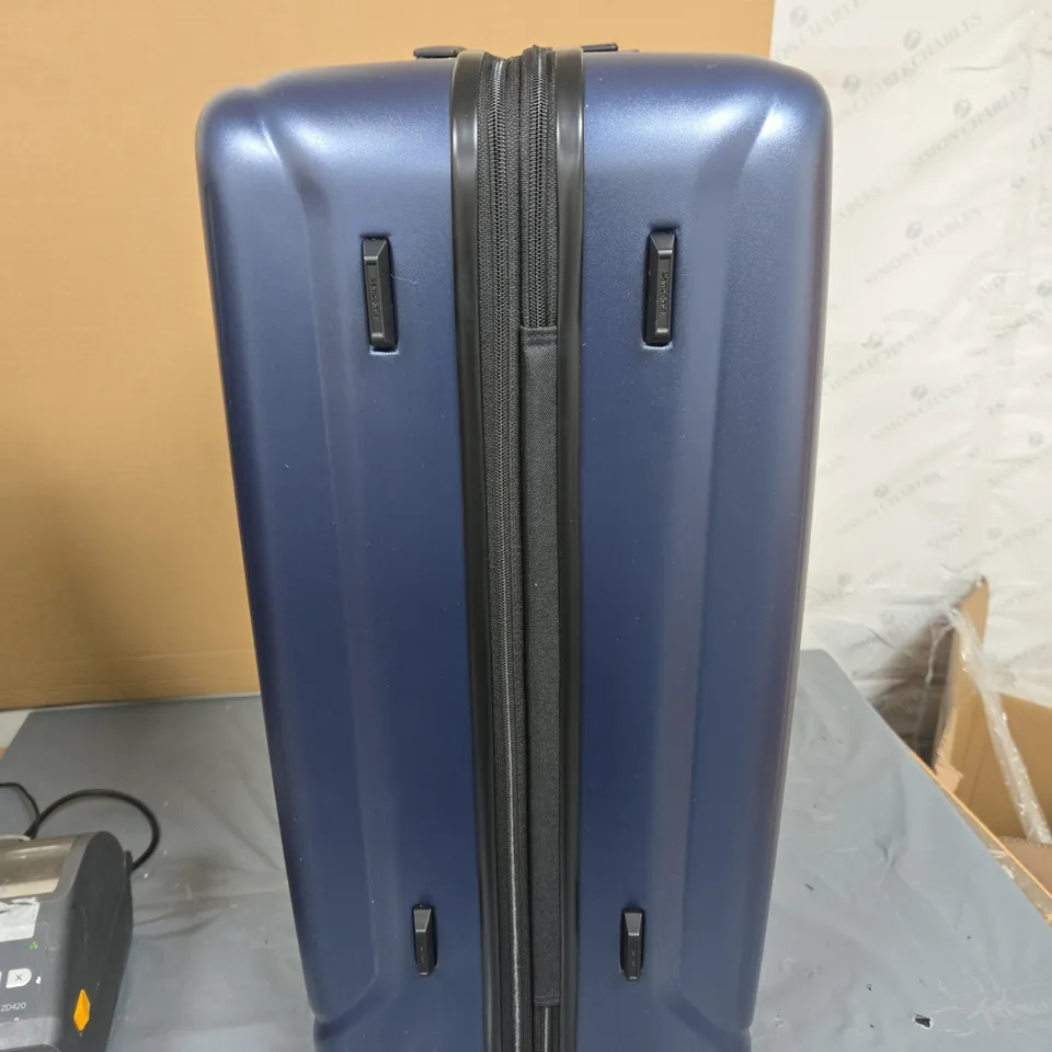 SAMSONITE NAVY BLUE HARD-SHELL SUITCASE WITH FOUR SPINNER WHEELS