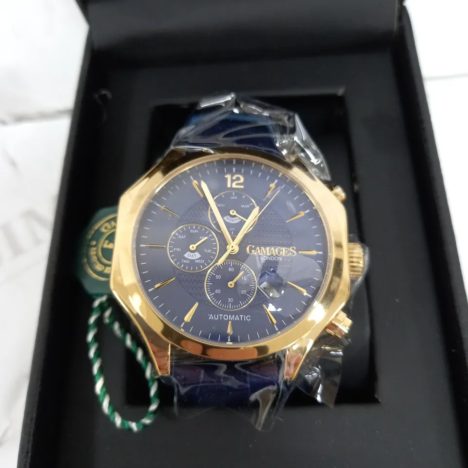 GAMAGES LONDON GRANDEUR GOLD & NAVY WATCH WITH LEATHER STRAP