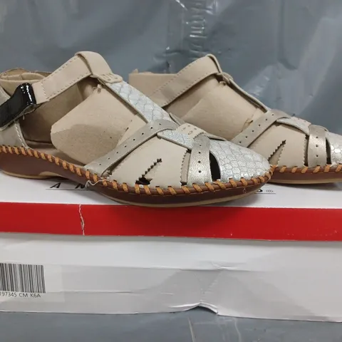 BOXED PAIR OF RIEKER SANDALS IN CREAM SIZE 6.5