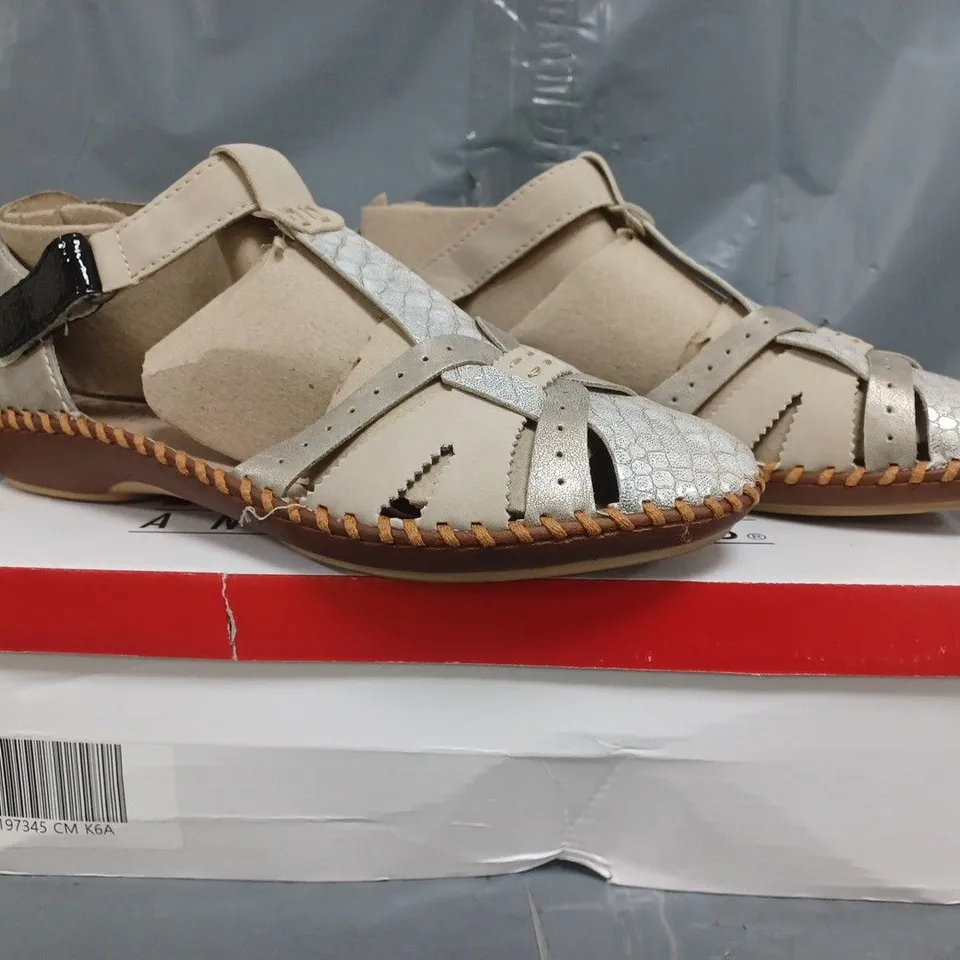 BOXED PAIR OF RIEKER SANDALS IN CREAM SIZE 6.5