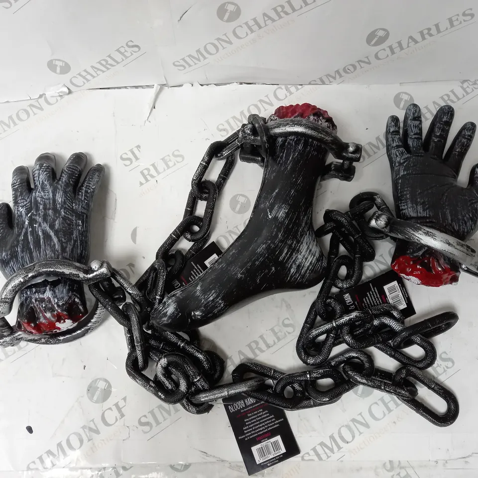 BOX OF APPROX 8 ASSORTED HALLOWEEN DECORATIVE ITEMS TO INCLUDE SEVERED HAND AND FOOT, BLOODY HOOK, CHAINED WEAPON. 