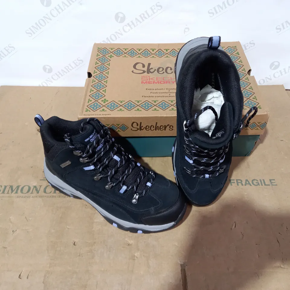 BOXED PAIR OF SKECHERS WALKING BOOTS- SIZE 7