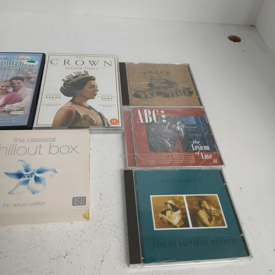 MULTI MEDIA BOX SET COLLECTION – THE CROWN S3, RISING DAMP, EDDIE MURPHY DELIRIOUS & RAW, THE CHILLOUT BOX & MORE