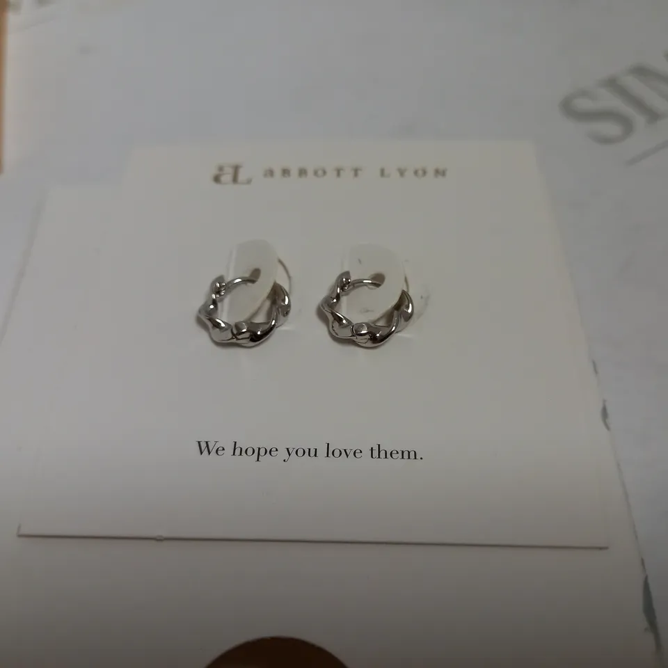 ABBOTT LYON TWISTED HUGGIE HOOPS EARRINGS