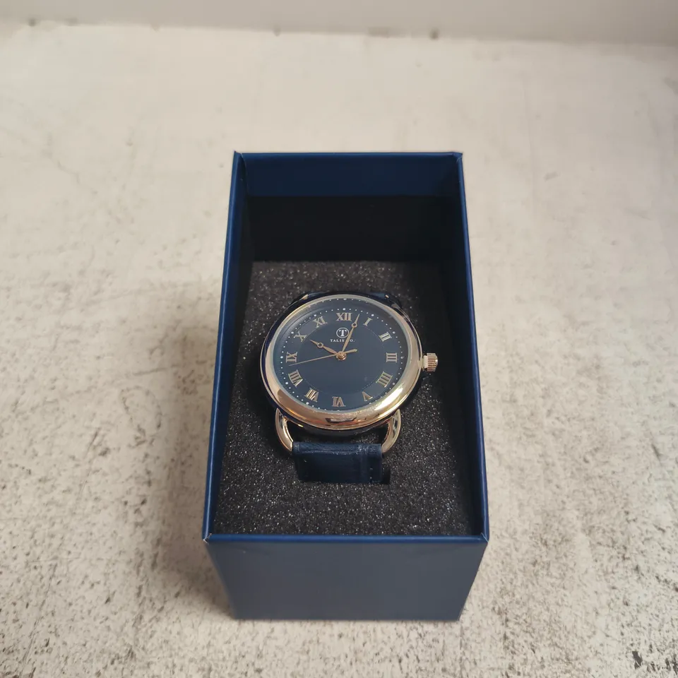 TALIS CO STAINLESS STEEL WATCH WITH BLUE DIAL AND BLUE LEATHER STRAP – BOXED