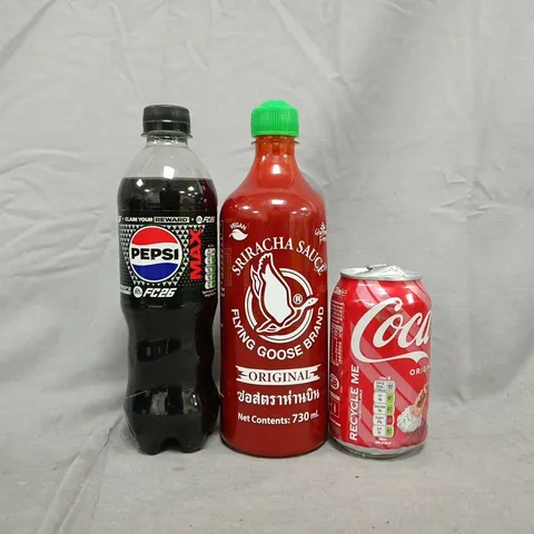 APPROXIMATELY 10 ASSORTED FOOD AND DRINK ITEMS TO INCLUDE COCA-COLA, PEPSI, SRIRACHA, ETC